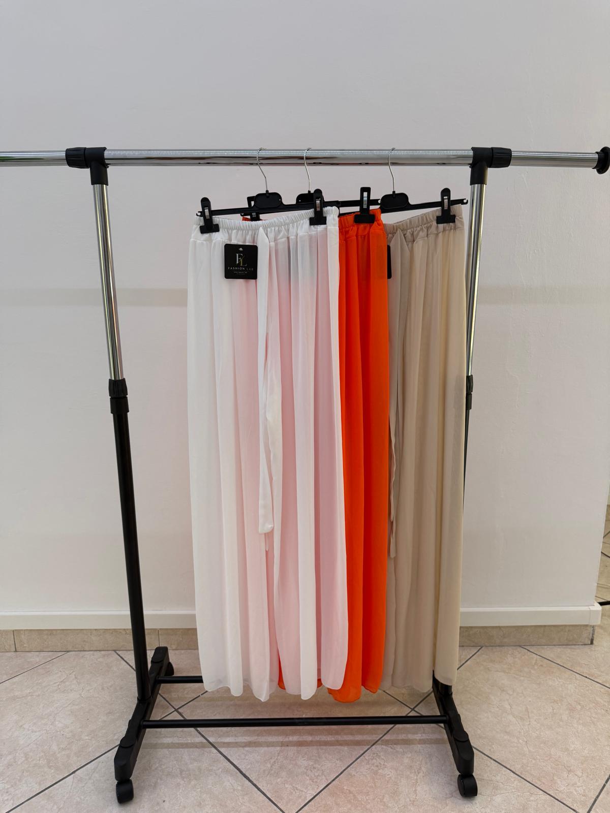 Copricostume gonna maxi in 4 colori su appendiabiti